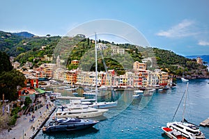 Beautiful small village Portofino with colorfull houses, luxury boats and yachts in little bay harbor. Liguria, Italy