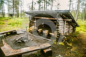 A beautiful small wooden building in the middle of Finnish forest