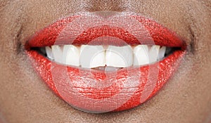 Beautiful smile african woman mouth lips with red lipstick and white teeth