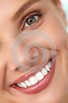 Beautiful Smile. Smiling Woman Face With White Teeth, Full Lips