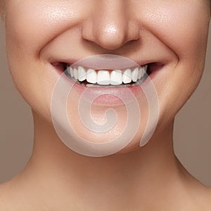 Beautiful smile with whitening teeth. Dental photo. Macro closeup of perfect female mouth, lipscare rutine