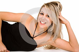 Beautiful Smiling Blonde Lying Down and Relaxing