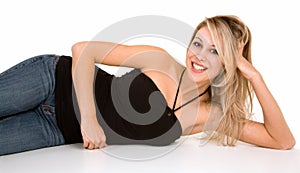 Beautiful Smiling Blonde Lying Down and Relaxing