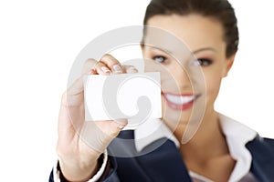 Beautiful smiling businesswoman with businesscard.