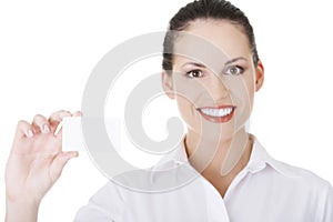 Beautiful smiling businesswoman with businesscard.