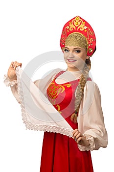 Beautiful smiling caucasian girl in russian folk costume on white