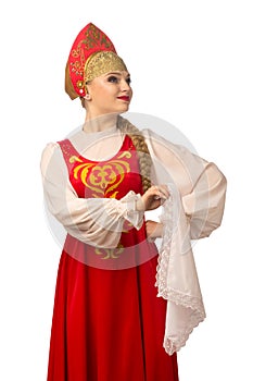 Beautiful smiling caucasian girl in russian folk costume on white