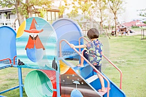 Beautiful smiling cute girl on a playground