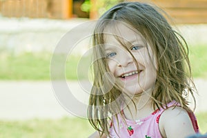 Beautiful smiling girl with blue eyes