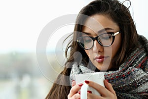 Beautiful smiling girl hold in arms cup portrait