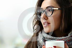 Beautiful smiling girl hold in arms cup portrait