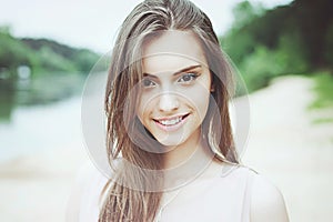 Beautiful smiling girl outdoor portrait