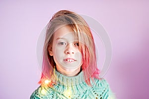 Beautiful smiling girl with pink hair posing for fashion shoot