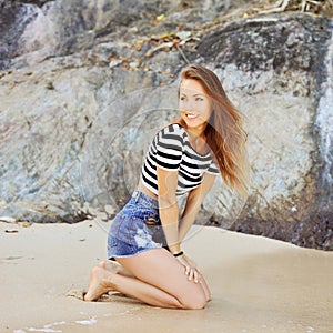 Beautiful smiling girl portrait outdoor at summer beach