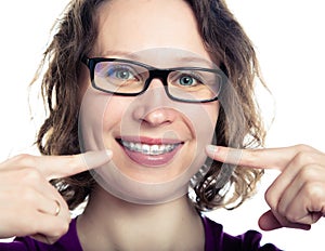 Beautiful smiling girl wearing braces.