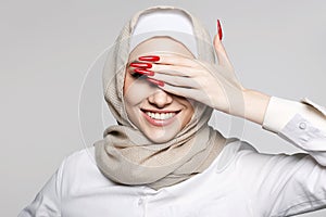 beautiful smiling islamic young woman with Make-up. beauty Happy girl in hijab
