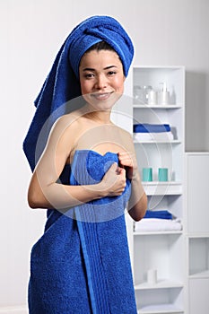 Beautiful smiling japanese woman in bathroom