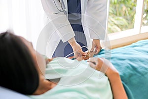 Beautiful Smiling medical doctor woman with stethoscope patient