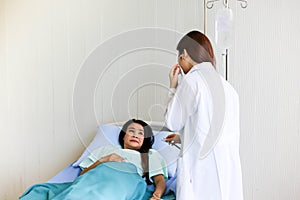 Beautiful Smiling medical doctor woman with stethoscope patient discussing,Healthcare concept