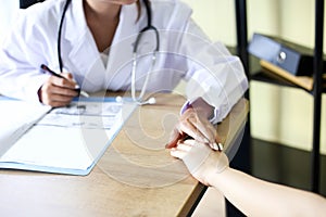 Beautiful Smiling medical doctor woman with stethoscope patient discussing,Healthcare concept