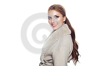 Beautiful smiling model woman in season coat isolated on white background, fashion portrait