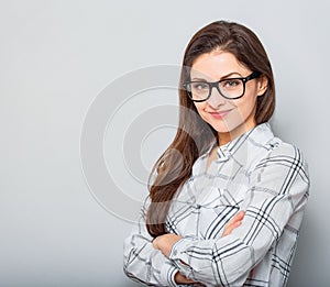Beautiful smiling positive successful business woman profile in glasses looking confidently in white shirt and long hair. Closeup
