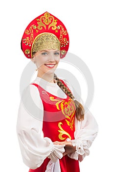 Beautiful smiling russian girl in folk costume