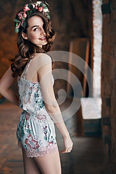 Beautiful smiling woman dancing and posing. Happy girl having fun