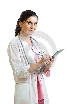 Beautiful smiling woman doctor hold pen filling patient history list at clipboard pad. Healthy lifestyle concept