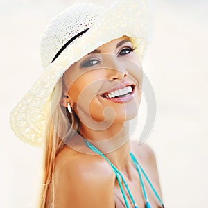 Beautiful smiling woman face closeup - perfect skin