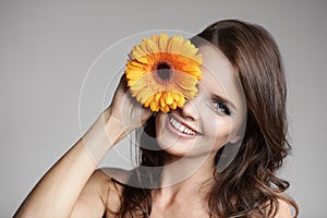 Beautiful Smiling Woman With Flower