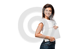 Smiling woman holding laptop, isolated on white