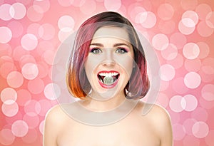 Beautiful smiling woman with a lollipop on bubble background