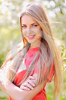Beautiful smiling woman outdoor portrait