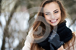 Beautiful smiling woman outdoor portrait