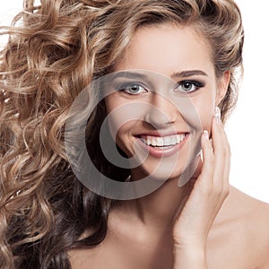 Beautiful smiling woman portrait. Isolated on white