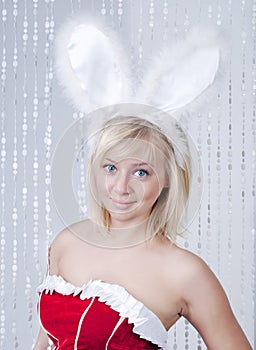 Beautiful smiling woman portrait with rabbit ears