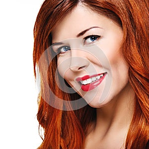 Beautiful smiling woman with red hair