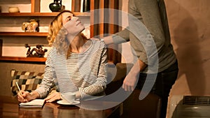 Beautiful smiling woman and stylish man meet in cafes