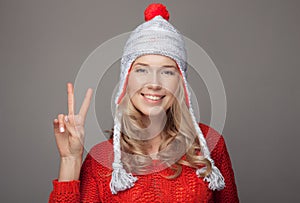 Beautiful smiling woman wearing winter clothing.