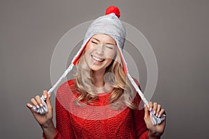 Beautiful smiling woman wearing winter clothing.