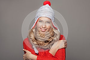 Beautiful smiling woman wearing winter clothing.