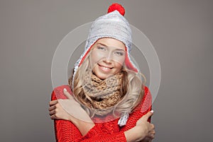 Beautiful smiling woman wearing winter clothing.