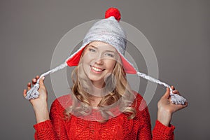 Beautiful smiling woman wearing winter clothing.