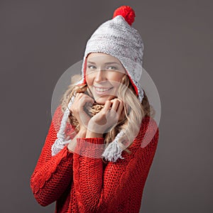 Beautiful smiling woman wearing winter clothing.