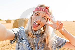 Beautiful smiling young blonde girl in headband