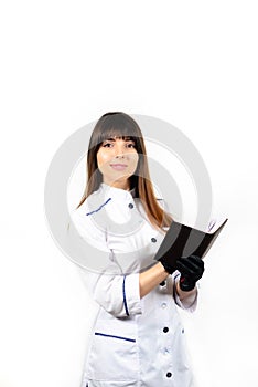 Beautiful smiling young female doctor in white medical jacket isolated on white background. Brunette woman cosmetologist holding