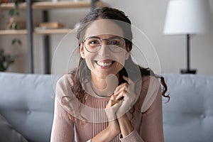 Beautiful smiling young woman holding video job interview.