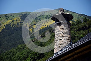 Beautiful smokestack on top of a roof