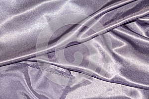 Beautiful smooth elegant wavy violet purple satin silk luxury cloth fabric texture, abstract background design. Card or banner